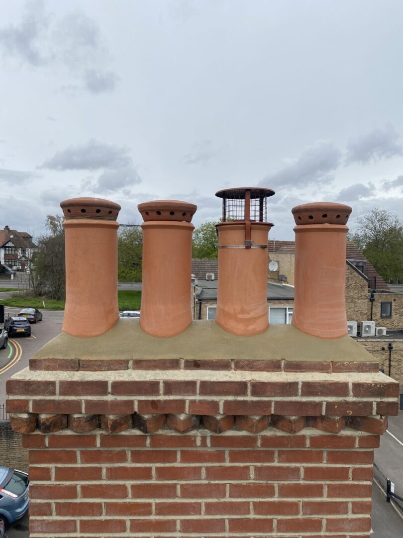 chimneys image on brick roof image